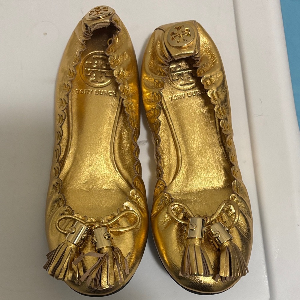 Tory Burch gold flats